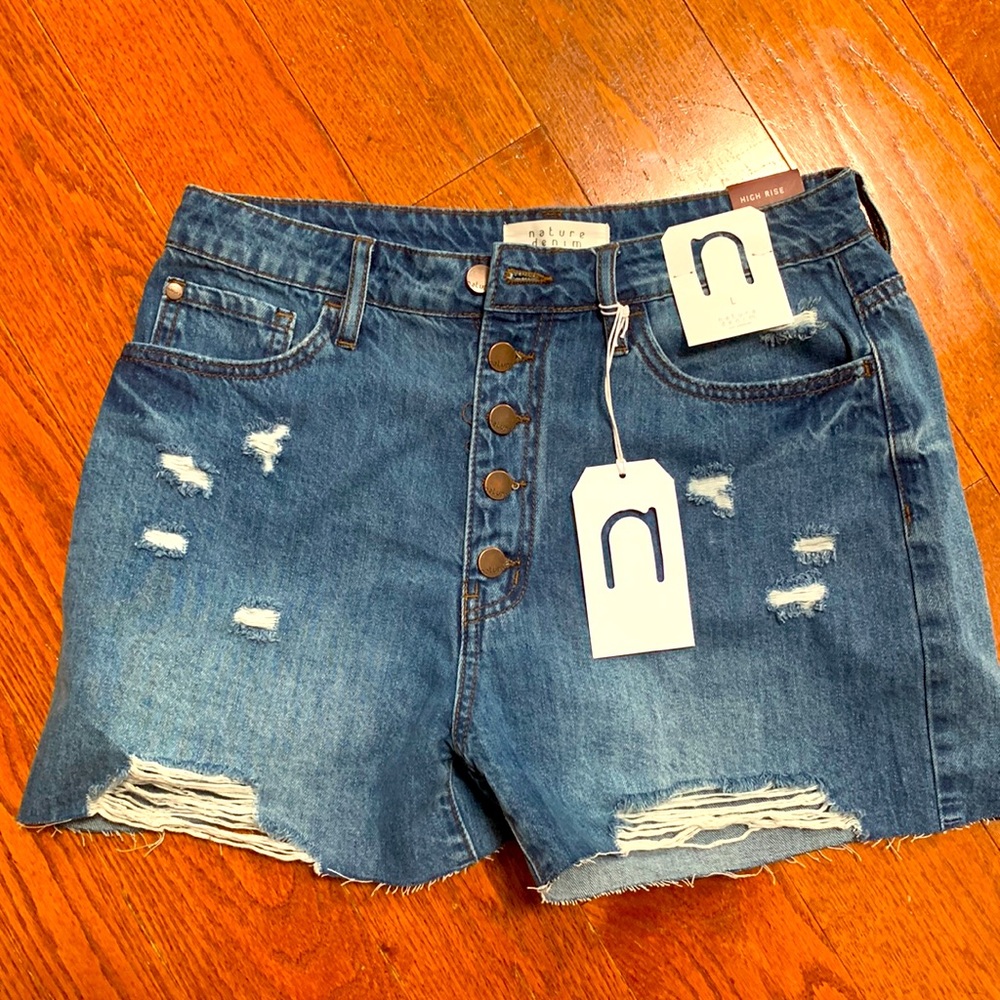 Torn Jean shorts